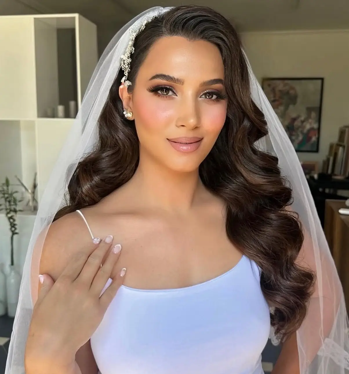 Bridal makeup with a polished updo