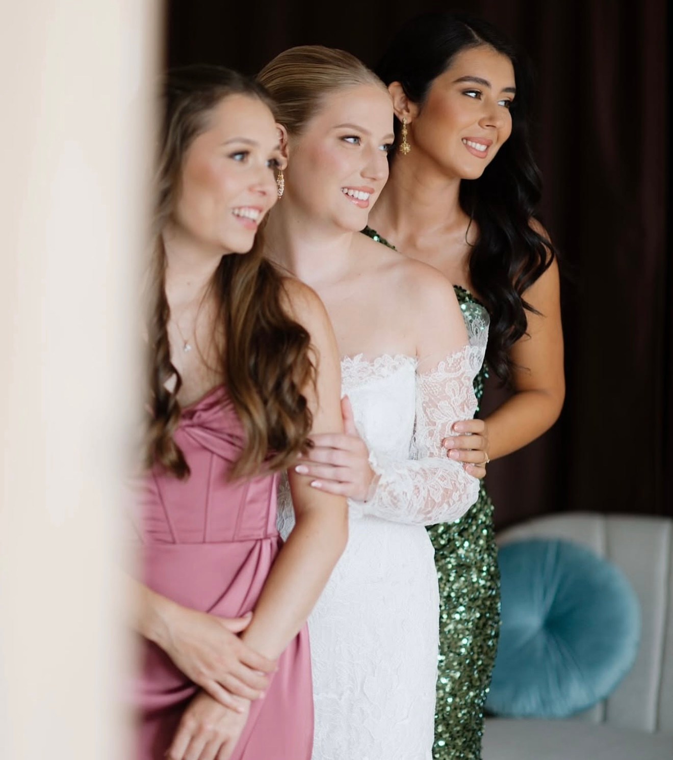 Bride with her bridesmaids after hair and makeup